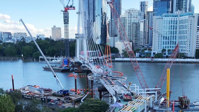 The much-anticipated Kangaroo Point Bridge is taking shape with the delicate operation to install the final span of the city-shaping project completed this week. Photo: Brisbane City Council.