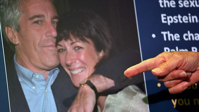 A photo of Ghislaine Maxwell and Jeffrey Epstein is seen as acting US Attorney for the Southern District of New York, Audrey Strauss, announces charges against Maxwell during a press conference in New York City in 2020. Picture: Johannes Eiselle/AFP