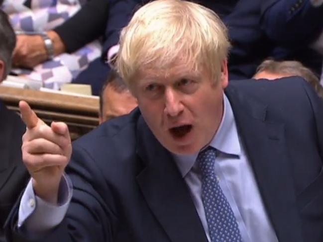 A video grab from footage broadcast by the UK Parliament's Parliamentary Recording Unit (PRU) shows Britain's Prime Minister Boris Johnson speaking during his first Prime Ministers Questions session in the House of Commons in London on September 4, 2019. - Prime Minister Boris Johnson headed into a fresh Brexit showdown in parliament on Wednesday after being dealt a stinging defeat over his promise to get Britain out of the EU at any cost next month. (Photo by - / PRU / AFP) / RESTRICTED TO EDITORIAL USE - MANDATORY CREDIT " AFP PHOTO / PRU " - NO USE FOR ENTERTAINMENT, SATIRICAL, MARKETING OR ADVERTISING CAMPAIGNS - EDITORS NOTE THE IMAGE HAS BEEN DIGITALLY ALTERED AT SOURCE TO OBSCURE VISIBLE DOCUMENTS