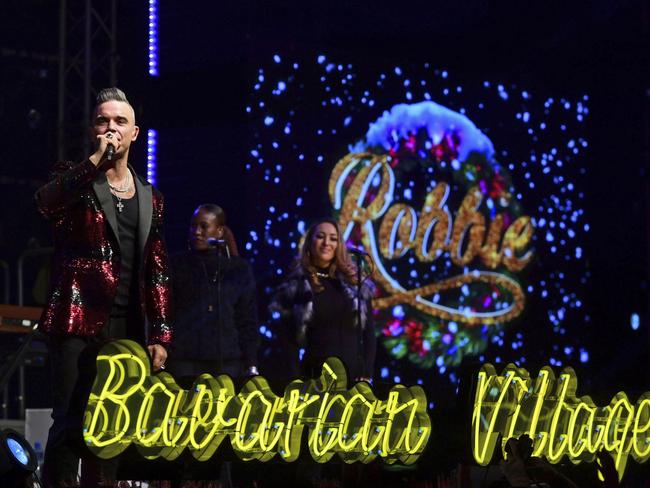 Singer Robbie Williams surprises fans with a performance at the Hyde Park Winter Wonderland in Hyde Park, London, to celebrate the release of his first Christmas album. Picture: AP