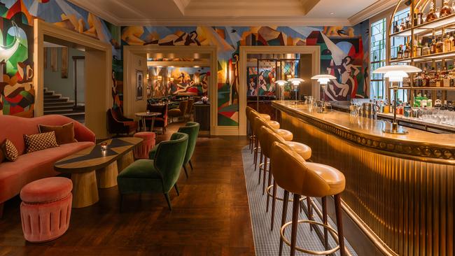 The velvet-swathed Art Deco Bar Magritte is the beating heart of Hotel Amigo. Picture: Supplied.