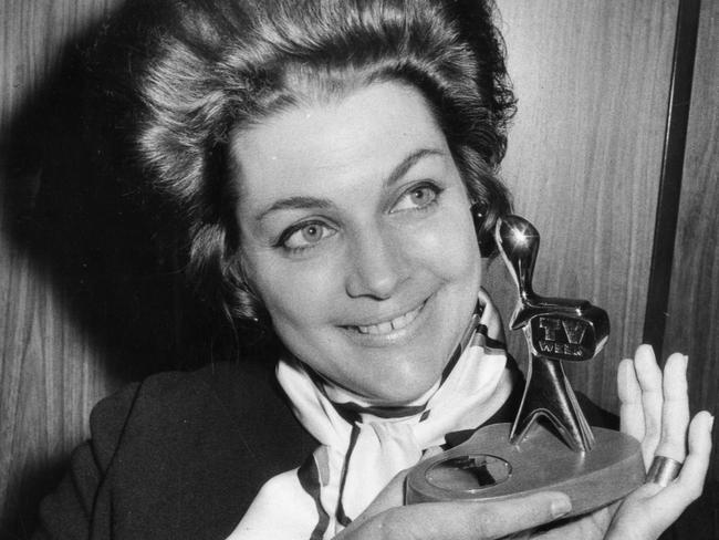 Posing with on of her two Gold Logies awards, in 1970. Picture: News Corp