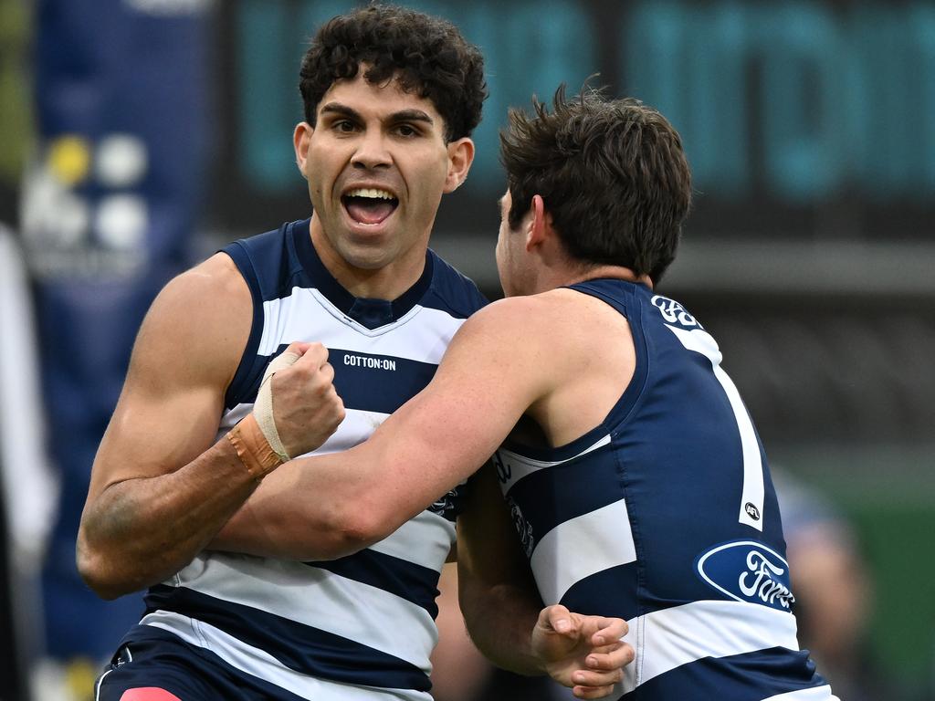 Tyson Stengle celebrates a goal with teammate Shaun Mannagh in the win over North Melbourne. Picture: Steve Bell/Getty Images