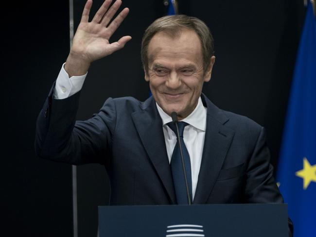 Outgoing European Council President Donald Tusk waves during the handover ceremony. Picture: AFP