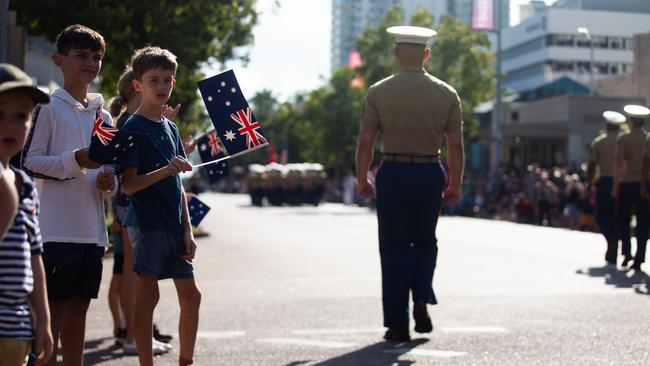 Children from Darwin, NT, Australia, watch U.S. Marines with Marine Rotational Force-Darwin 22, march in a parade during the 107th Commemorative Service in honour of Australian and New Zealand Army Corps (ANZAC) Day on April 25, 2022. Picture: Cpl. Cedar Barnes