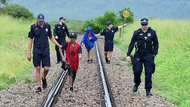 Police find and arrest two alleged juvenile offenders hiding in bushland south of Townsville near Cape Cleveland. Picture: Shae Beplate.