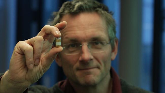 Michael Mosley with a miniature pill camera to examine the tapeworms in his guts.