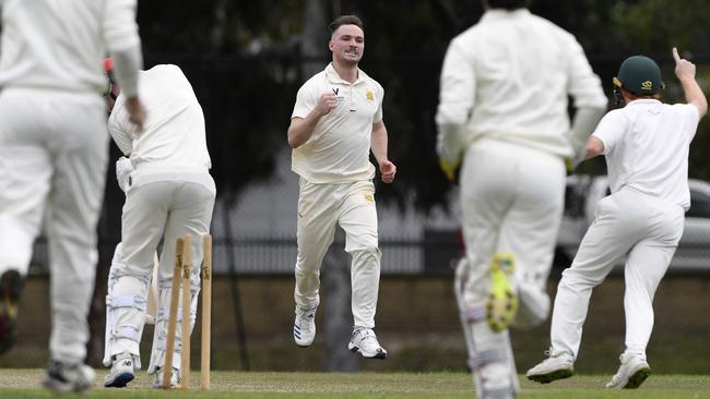 Sam Harbinson celebrates a wicket for Northcote. Picture: Andy Brownbill