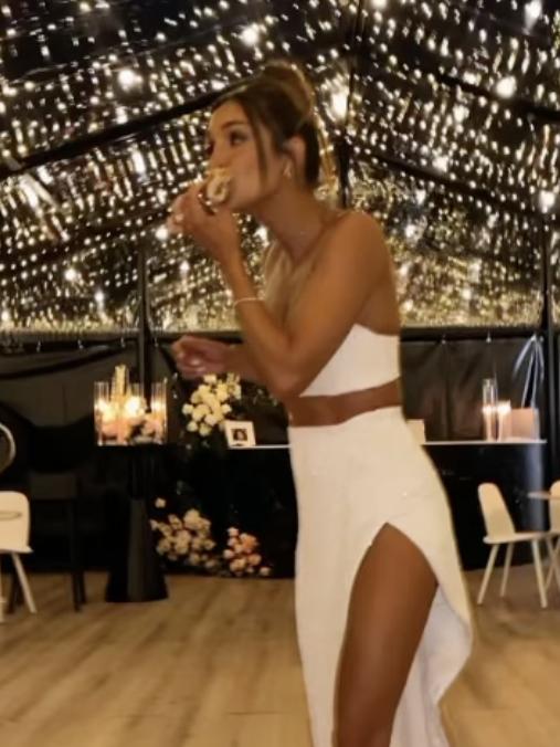 Kayla Itsines snacking on the dancefloor. Picture: Instagram