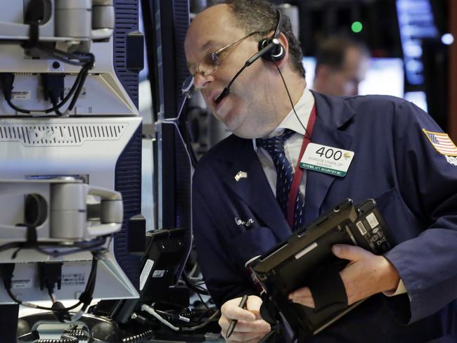 Trader Gordon Charlop works on the floor of the New York Stock Exchange, Wednesday, Nov. 25, 2015. Stocks are drifting higher in early trading as markets start to wind down ahead of the Thanksgiving holiday in the U.S. (AP Photo/Richard Drew)