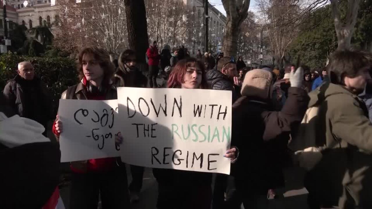 New Georgian president sworn in amid protests against legitimacy