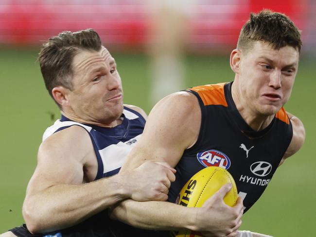 MELBOURNE, AUSTRALIAÃ June 21 , 2024.  AFL Round 15. Carlton vs Geelong at the MCG.   Sam Walsh of the Blues  gets tackled into the turf by Patrick Dangerfield of the Cats during the 1st qtr.     . Pic: Michael Klein