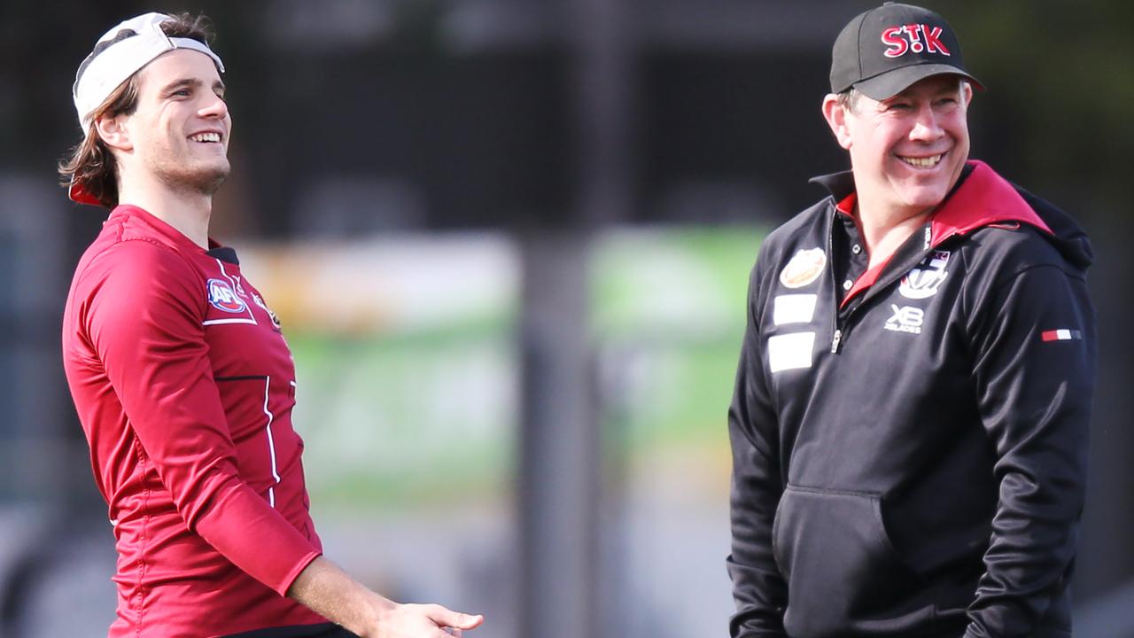 Saints skipper Jack Steele with coach Brett Ratten at training. (AAP Image/Michael Dodge)