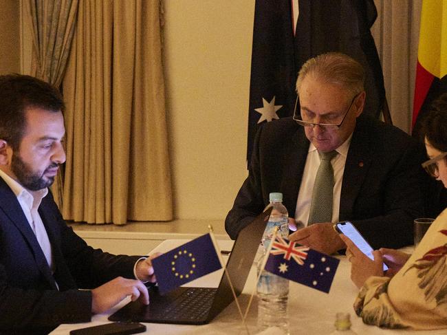 Trade Minister Don Farrell (centre) with senior media advisor Grace Finch (right) and chief-of-staff Ben Rillo communicate with Prime Minister Anthony Albanese and Agricutlure Minister Murray Watt and other stakeholders immediately following a one-on-one meeting between Senator Farrell and European Union Trade Commissioner Valdis Dombrovskis in Osaka, Japan, October 30,2023. Picture: Supplied