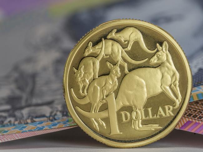 Australian $1 coin and notes close-up, investing, generic