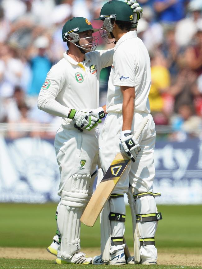 Phil Hughes congratulates Ashton Agar on his debut half century.