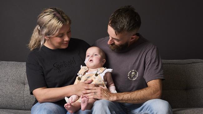 Parents, Alysha Curnow and Joshua Murray with Indigo Daisy Murray, 9 months old, at home in Kudla, Sunday, March 24, 2024. Picture: Matt Loxton