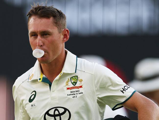 PERTH, AUSTRALIA - NOVEMBER 24: Marnus Labuschagne of Australia walks off the field after being dismissed by Jasprit Bumrah of India for 3 runs during day three of the First Test match in the series between Australia and India at Perth Stadium on November 24, 2024 in Perth, Australia. (Photo by Cameron Spencer/Getty Images)