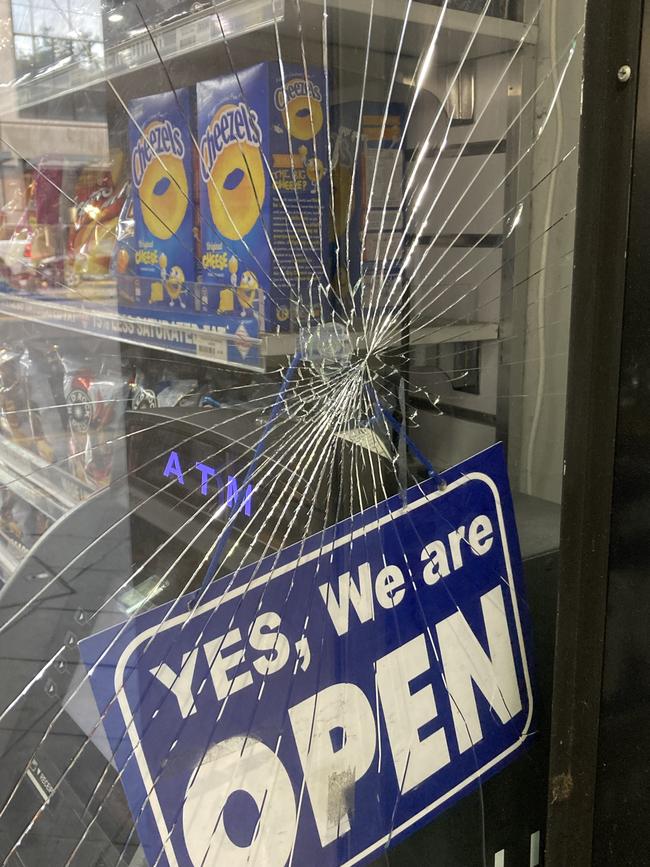 The owner of this King William St store says he won't replace his doors broken by thieves any more because it costs $600 each time. Picture: Mile Kemp