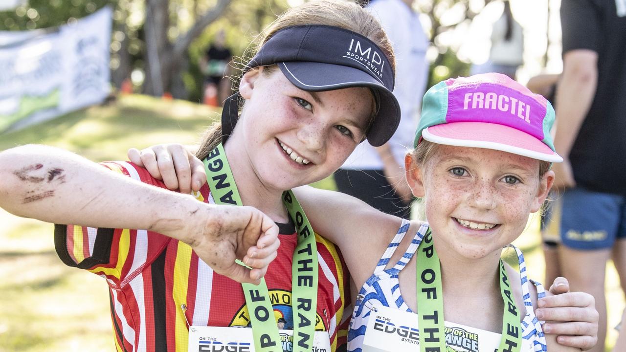 Eden Broksch, second and Violet Richardson first in the 5km event. Top of the Range adventure trail run at Picnic Point. Sunday, April 2, 2023. Picture: Nev Madsen.