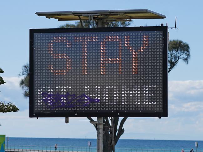 A Stay at Home sign is seen in Rye, Sunday, April 19, 2020. Authorities have said social distancing and isolation measures could still remain in place for the next six months.  A shutdown of non-essential services is in effect Australia wide in a bid to slow the spread of the coronavirus (COVID-19) disease.  (AAP Image/Scott Barbour) NO ARCHIVING