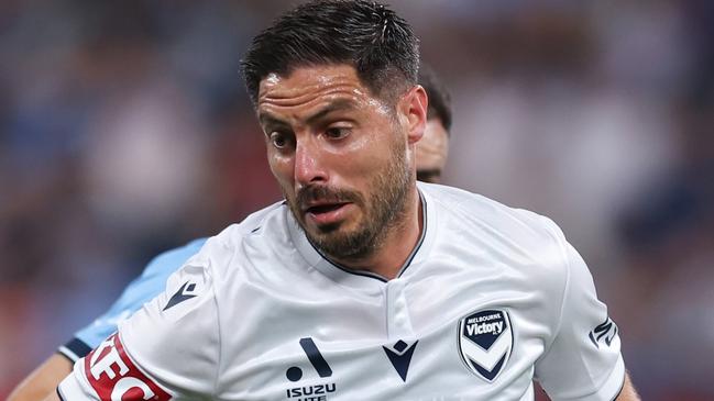 SYDNEY, AUSTRALIA - DECEMBER 28: Bruno Fornaroli of the Victory competes with Anthony Caceres of Sydney during the round 10 A-League Men match between Sydney FC and Melbourne Victory at Allianz Stadium, on December 28, 2024, in Sydney, Australia. (Photo by Brendon Thorne/Getty Images)