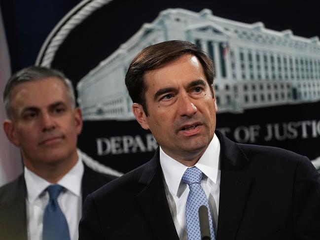 WASHINGTON, DC - OCTOBER 04: Assistant U.S. Attorney General for National Security John C. Demers (R) speaks as United States Attorney for the Western District of Pennsylvania Scott W. Brady (L) listens during a news conference to announce criminal chargesÊOctober 4, 2018 in Washington, DC. Seven Russian GRU intelligence officers have been indicted for their alleged roles in hacking and related influence and disinformation operations targeting international anti-doping agencies, sporting federations and anti-doping officials.   Alex Wong/Getty Images/AFP == FOR NEWSPAPERS, INTERNET, TELCOS & TELEVISION USE ONLY ==