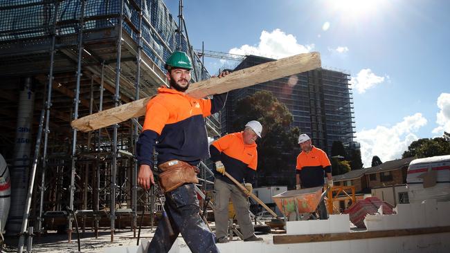 Workers at a building site in Sydney. Picture: Richard Dobson