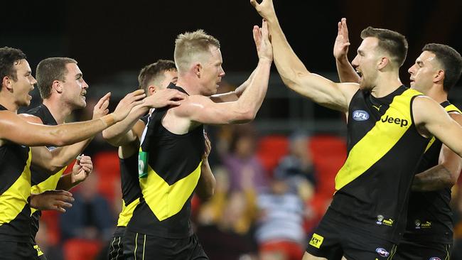 The Tigers celebrate a Jack Riewoldt goal in the Round 17 win over the Cats. Picture: Chris Hyde/Getty Images)