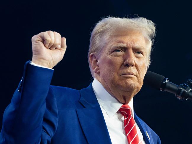 PHOENIX, ARIZONA - DECEMBER 22: U.S. President-elect Donald Trump speaks during Turning Point USA's AmericaFest at the Phoenix Convention Center on December 22, 2024 in Phoenix, Arizona. The annual four day conference geared toward energizing and connecting conservative youth hosts some of the country's leading conservative politicians and activists.   Rebecca Noble/Getty Images/AFP (Photo by Rebecca Noble / GETTY IMAGES NORTH AMERICA / Getty Images via AFP)