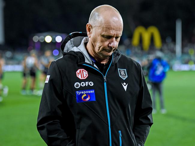 ADELAIDE, AUSTRALIA - APRIL 05:  Ken Hinkley, Senior Coach of the Power  leave the ground after winning   the round four AFL match between Port Adelaide Power and Essendon Bombers at Adelaide Oval, on April 05, 2024, in Adelaide, Australia. (Photo by Mark Brake/Getty Images)