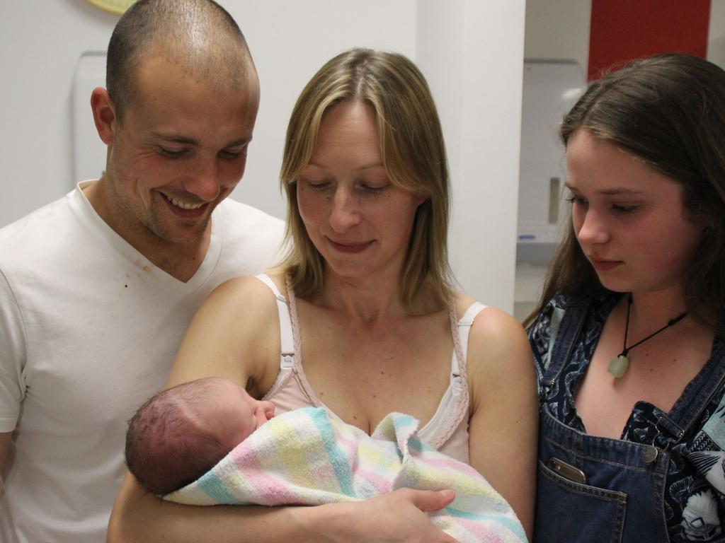 Tasmanian parents Marcus and Karin with newborn baby Wilson and their eldest child. Picture: Contributed