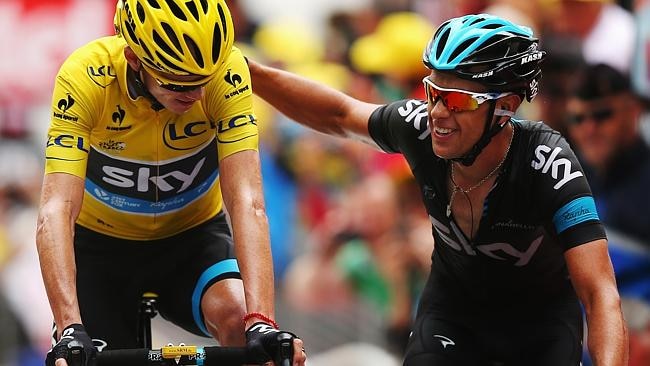 Chris Froome and Richie Porte cross the finish line after climbing l'Alpe d'Huez. (Photo by Bryn Lennon/Getty Images) 