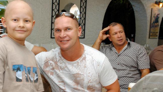 Allan Langer at the Breakfast Creek Hotel with Mathew West, aged 8. Picture: Robert Shakespeare