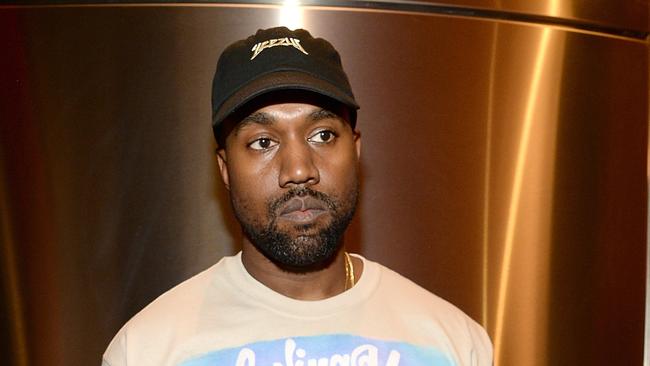 Cap in hand ... Kanye West needs money. Picture: Kevin Mazur/Getty Images