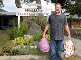 COMMUNITY SUPPORT: Mark Ellis holds a fraction of the bags donated for the Homeless Health Care Day. Picture: Eden Boyd