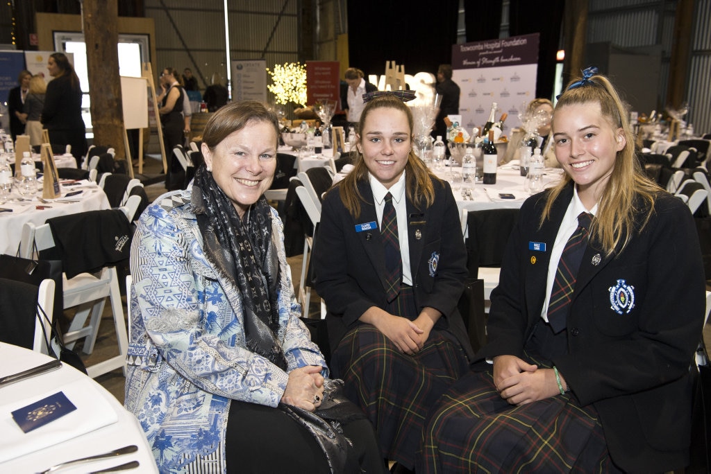 Guest speaker Dr Fiona Wood chats with Fairholme College students Claire Waugh and Halle Carr (right) at the Women of Strength luncheon at Blank Space, Friday, July 20, 2018. Picture: Kevin Farmer