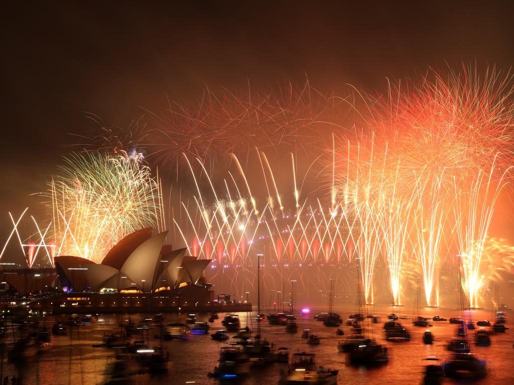 New Year's Eve midnight fireworks over Sydney Harbour as seen from Mrs Macquarie's Chair. Picture: Jonathan Ng