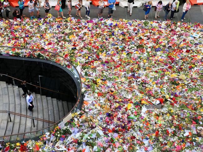 The floral tribute at Martin Place continues to expand. Pic: Toby Zerna