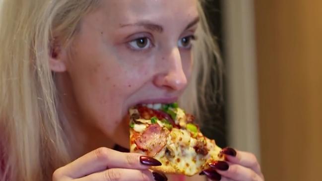 Apparently eating pizza is a shocking activity for a newlywed to engage in. Picture: Channel 9