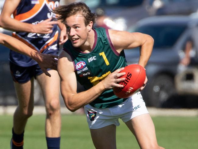 14/4/19 Tasmania Devils versus Calder Cannons in NAB League clash at Penguin. Devils M. O'Neill breaks away from his opponent. Picture: GRANT WELLS