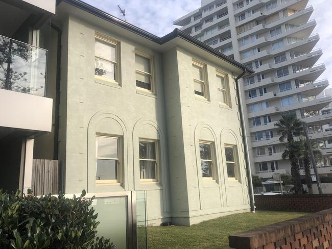 A two-storey block of 98-year-old units at the corner of North Steyne and Denison St, Manly, which is proposed to be demolished to make way for a five-storey block of luxury beachfront apartments. There is a 15-storey building on the opposite corner. Picture: Jim O’Rourke