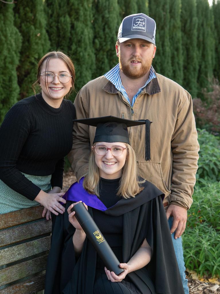 Hannah Clifford (left) and Nick Lane attended the Bachelor of Laws graduation for Holly Clifford. UniSQ graduation ceremony at Empire Theatre. Wednesday, June 28, 2023