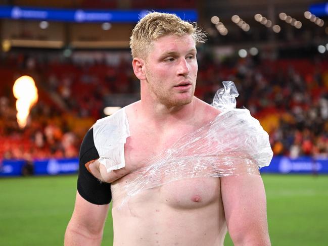 Prop Thomas Flegler ices his injured shoulder after the Dolphins v Tigers clash at Suncorp Stadium. Picture: NRL Images