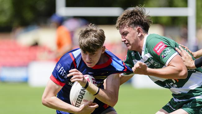 Tyler Boulton (right) of Ipswich Jets tackles Cooper Brown of Western Clydesdales. Picture: Kevin Farmer