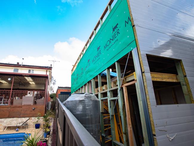 The granny flat sits right on the fence line, causing the dispute. Picture: Julian Andrews