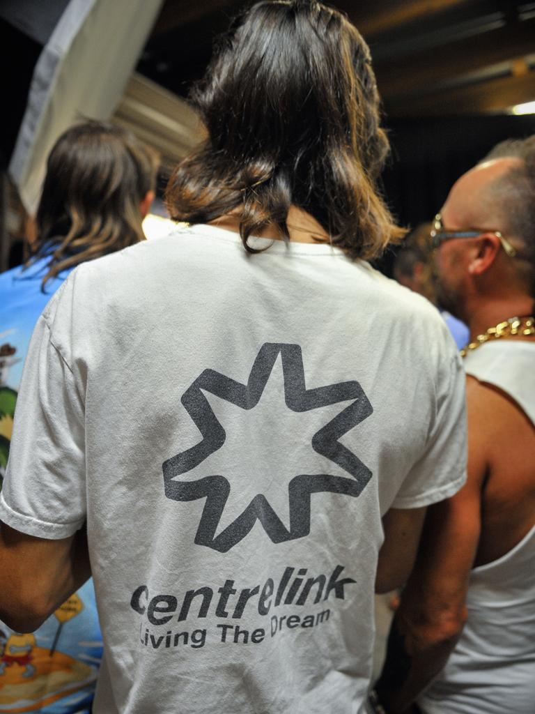 Participants are seen during Mulletfest, a special event designed to celebrate the hairstyle that's all about business at the front, party at the back, at Chelmsford Hotel in Kurri Kurri, NSW. (AAP Image/Perry Duffin) 