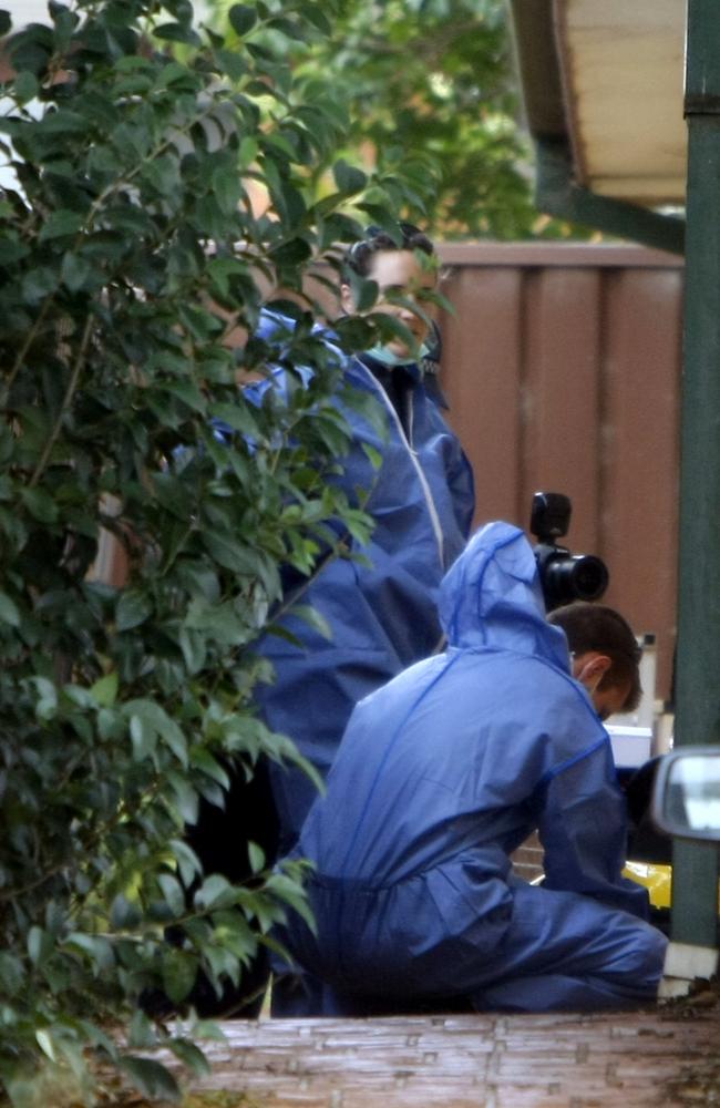 Police forensic teams at the home of Chamanjot Singh and Manpreet Kaur.