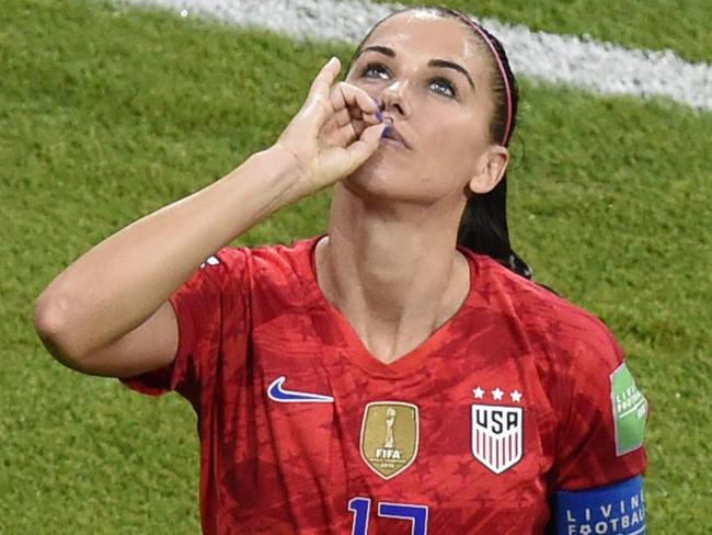 USA player Alex Morgan’s ‘tea-sipping’ celebration after she scored against England at the Women’s World Cup. Picture: AFP