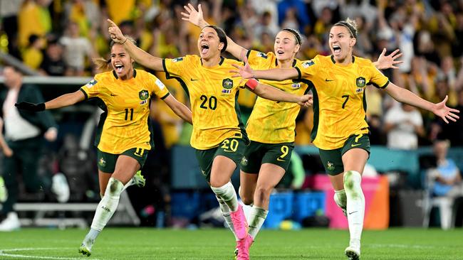 Mary Fowler, Kerr, Caitlin Foord and Steph Catley celebrate Saturday’s heroic win over France. Picture: Getty Images